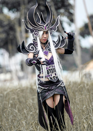 Illustration for article titled A League of Legendary Cosplayers